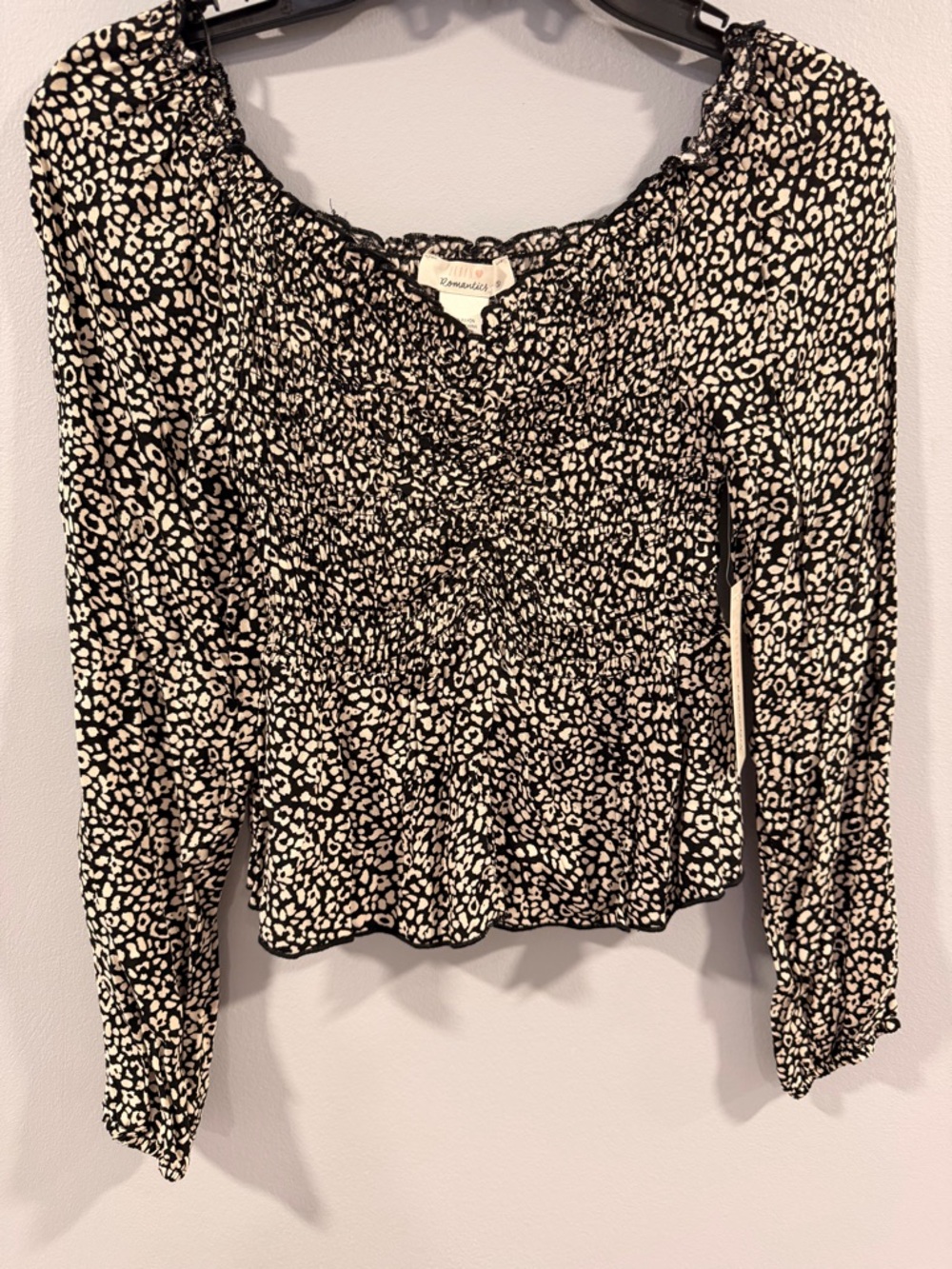 Black and White Smocked Peplum Long-Sleeve Top